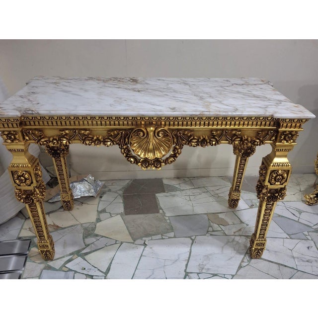 DIMENSIONS Width: 57.1" Depth: 28.3" Height: 36.6" MATERIALS Solid wood construction Natural Italian marble top MARBLE TOP...