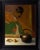 This oil on panel artwork features a serene still life arrangement, with a traditional teapot and fortune cookies set...