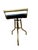 This cool piece is a fully functional swivel music stool that changes height by spinning. It's made of brass and has a...