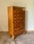 This apothecary bank of drawers was designed and made in Denmark , late 19th century. It is made from solid wood with...