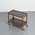 Rolling serving cart designed by Isamu Kenmochi and manufactured by Yamaguchi in Japan in the 1970s. The wooden structure...