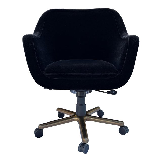 Executive ‘Bumper’ desk chair upholstered in black mohair having hydraulic mechanism and five prong bronze plated base,...