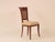 Offered is a set of six lovely and elegant dining chairs. This comfortable chair offers an elegant cane back as a standard...