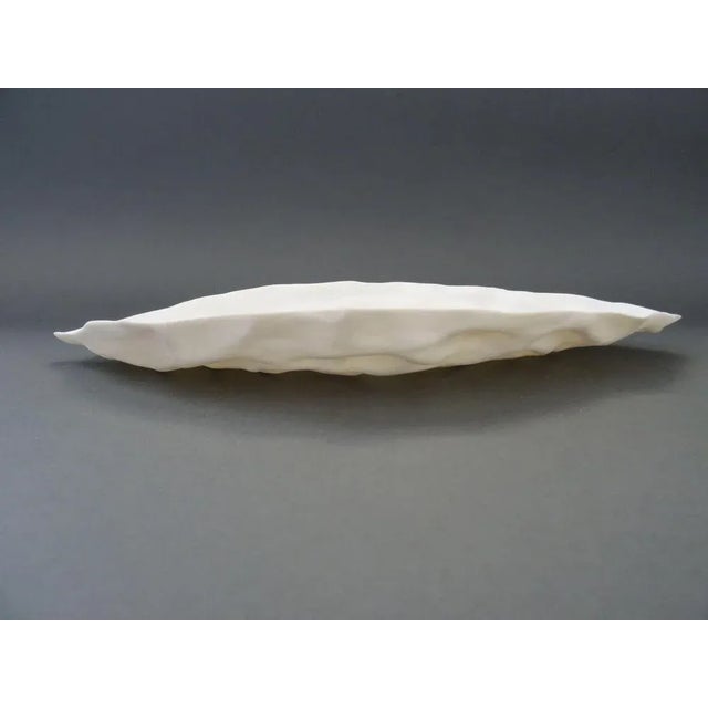 Decorative plate "Interaction". Porcelain h 5 cm; w 20 cm I have official proof of authenticity such as vintage catalogs,...