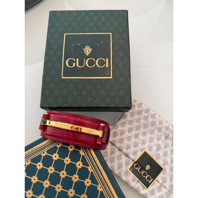 Metal 1990’s Gucci Red Crocodile Style Leather Bracelet With Gold Tone Engraved Logo Narrow Horse Bit For Sale - Image 7 of 11