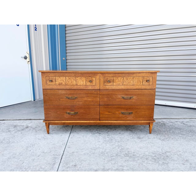 Mid-Century Walnut & Burl Wood Dresser by Lane This beautifully crafted mid-century modern dresser by Lane showcases the...