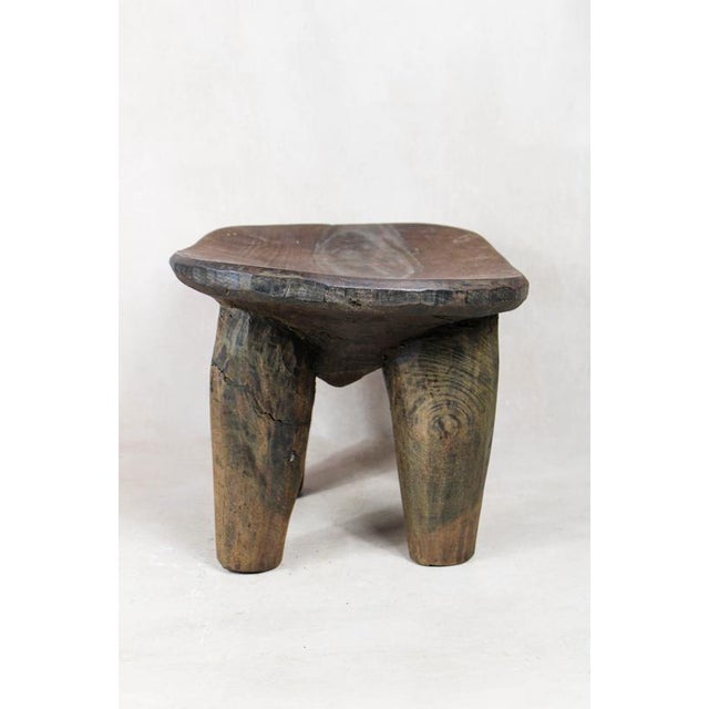 Discover the timeless elegance of the senufo stool elevate your living space with the authentic charm of the senufo stool,...