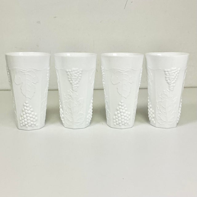 Offering a rest of 4 Grape Milk Glass Tumblers from the Colony Brand of Indiana Glass Company. The Glasses have the...
