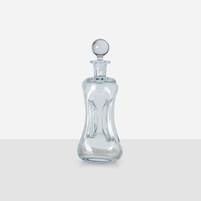 Description Kluk Kluk Decanter by Jacob Bang for Holmegaard Denmark, c1960s Tall clear glass decanter with indented sides,...