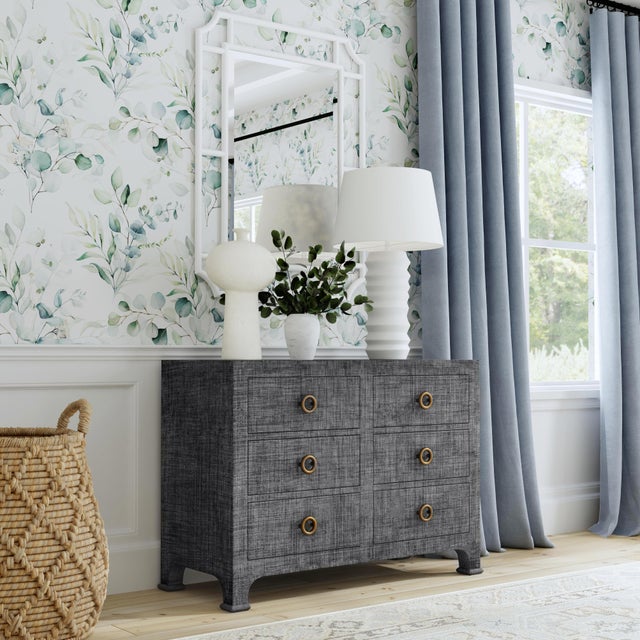 This versatile 6 drawer dresser is meticulously crafted and wrapped in woven raffia for a look that feels both tactile and...