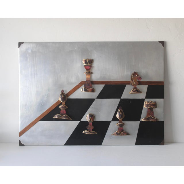 A signed aluminum and copper chess board game wall art piece by artist Alex Kovacs, 1976, USA. Signed and dated 1976 as...