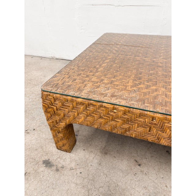 This Woven Rattan Square Coffee Table blends natural texture with airy elegance, featuring a handwoven rattan base topped...