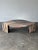 Cut from Fior di Pesco marble, this vintage coffee table carries a cool grey ground threaded with soft rose, ivory, and...