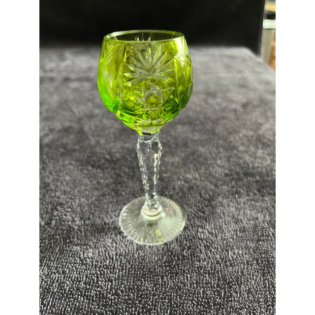 For your consideration is a set of six Beautiful Emerald green grape pattern sherry glass with clear cut stem. These are a...