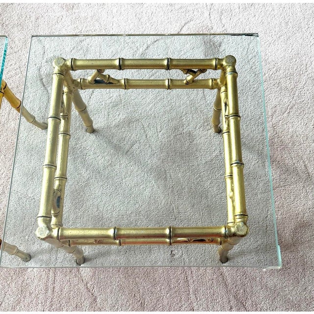 Pair of Phyllis Morris Style Gilt Faux Bamboo Gold Side Tables These side tables, although unsigned or marked, have been...