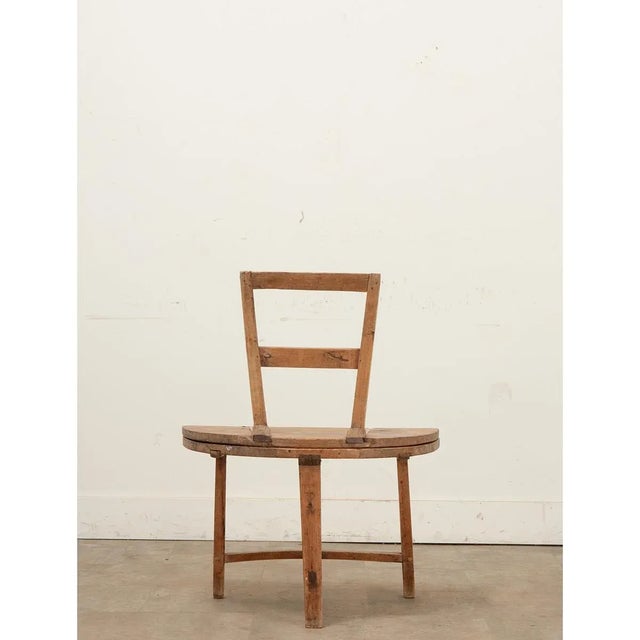 Table Dimensions: 18” H x 28 ¼” W x 28 ¼” D A Swedish pine chair/table from the 1700’s, this functional antique is a chair...