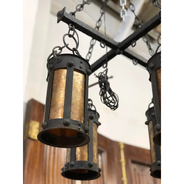 This really is such a great Spanish revival reproduction light. This light is brand new made to look old. It has beautiful...