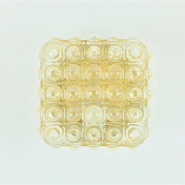 Stunning pair of bubble glass wall lights/sconces by Helena Tynell for Limburg, Germany's leading glasswork, renowned for...