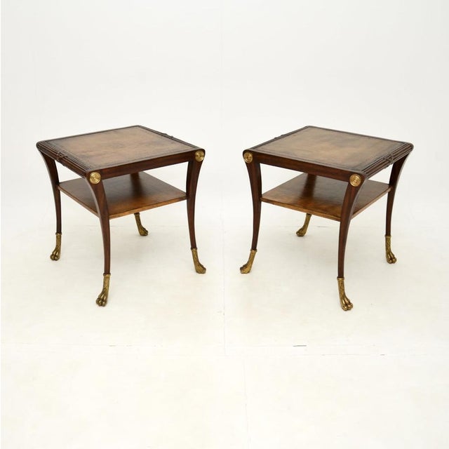 An impressive pair of antique Regency style leather top side tables. They were made in England, they date from around the...