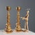 Pair of turned, carved, and gilded wooden torch holders. Wax tray in perforated, gilded iron. This piece is attributed to...