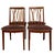 Set of four mid century modern dining chairs, imported from the United Kingdom, featuring a distinctive sculptural a...