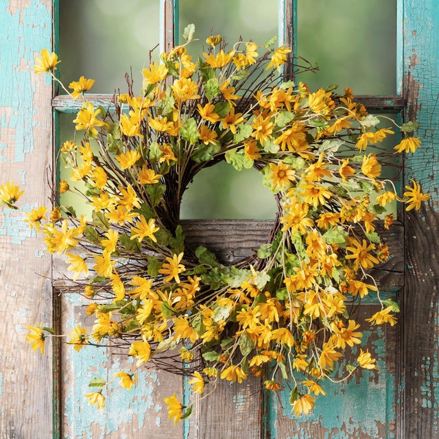 Bring the bright charm of spring to your home with this vibrant Yellow Daisy Floral Wreath. Featuring cheerful yellow...
