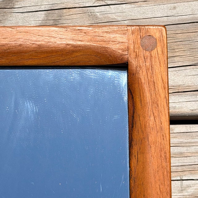 An excellent example of Danish quality, this mid century modern mirror designed by Aksel Kjersgaard is the perfect...