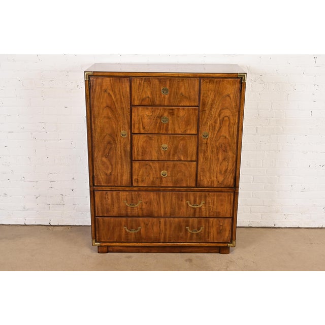 A gorgeous mid-century modern Hollywood Regency Campaign style armoire dresser or gentleman's chest By Drexel Heritage...