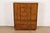 A gorgeous mid-century modern Hollywood Regency Campaign style armoire dresser or gentleman's chest By Drexel Heritage...