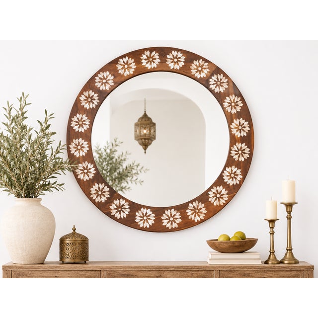 This beautiful boho modern mirror would be a staple in any home. Our blossom mother of pearl inlay collection is inspired...