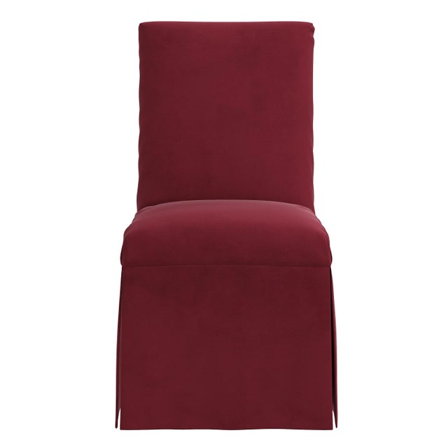 Finish your dining room with a touch of elegance with this Slipcover Dining Chair. This pretty dining chair features a...