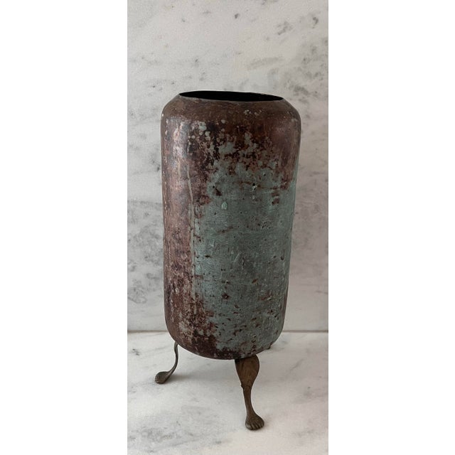 Antique copper and brass vessel with beautiful blue green patina throughout and claw feet detail. Many possible uses as a...