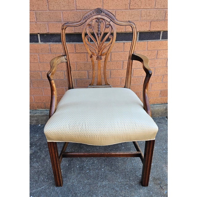 A mid 18th to Early 19th Century George III Mahogany upholstered Armchair. Very sturdy antique condition with newer...