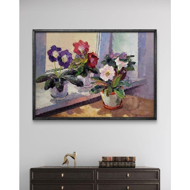 The Oil painting on Canvas titled “Gloxinia in a vase” captures the quiet and graceful beauty of houseplants arranged on a...