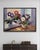 The Oil painting on Canvas titled “Gloxinia in a vase” captures the quiet and graceful beauty of houseplants arranged on a...