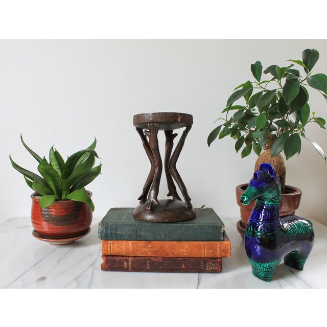 Vintage hand carved wood African decorative object with hands. No makers mark. Some age wear to wood. Pictured.
