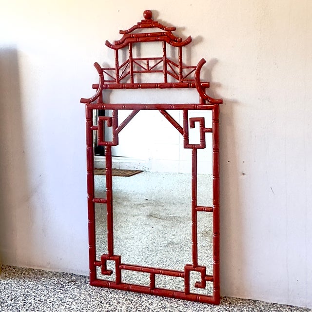 RELOCATION SUPER SALE! HUGE MARK DOWNS This striking 1960s authentic Chinoiserie mirror features a bold red lacquer finish...
