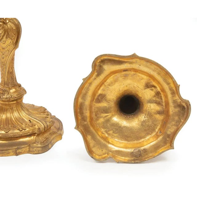 Louis XV-style, gilt bronze candle sticks *previously wired as lamps Dimensions: H: 10 in, Base: 5.5 in.