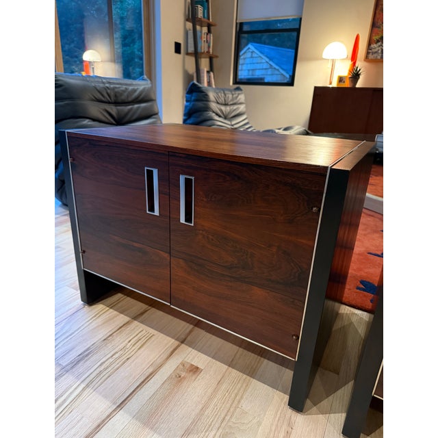 Available is a set of chrome and rosewood console tables or nightstands from John Stuart. These were produced in the 1960s...