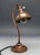Table lamp, manufactured in Germany. It is made of copper and brass. It is preserved in good condition, has small traces...