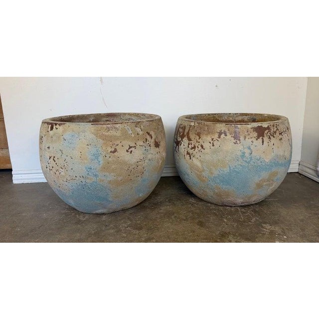 A magnificent and highly coveted pair of monumental low bowl planters, in the revered style of Atelier Vierkant, Belgium....