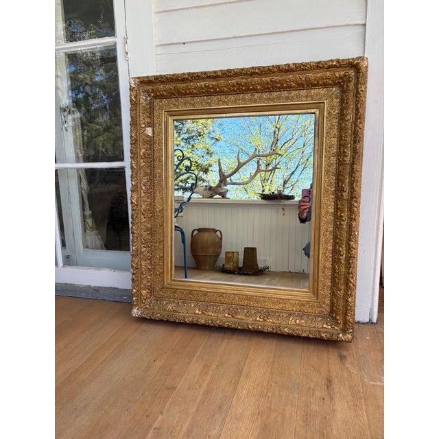 Gorgeous Victorian mirror in an ornate wood gilt and plaster frame.
