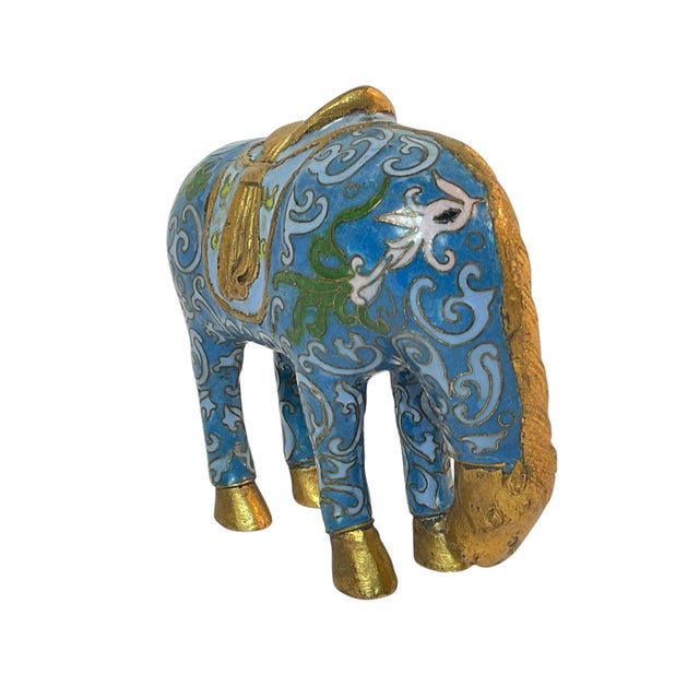 Beautiful vintage Chinese cloisonné horse figurine / statue. Features an enameled brass body of blue and gold tones. The...