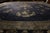 Hand-knotted in wool originating from East Turkestan circa 1920, this antique art deco rug connotes a Samarkand rug...