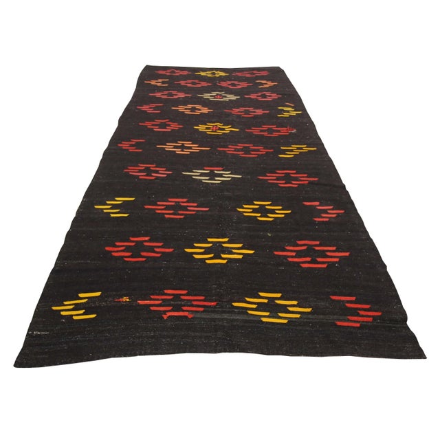 Vintage Handwoven kilim rug from Afyon region of Turkey. Approximately 50-60 years old. In very good condition