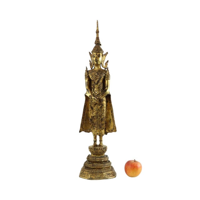 A magnificent and rare authentic antique bronze standing Buddha from Thailand (Rattanakosin period); a large piece gilded...