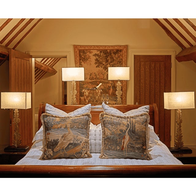 This richly textured woolblend tapestry cushion showcases a beautiful bird set against a verdant forest backdrop....