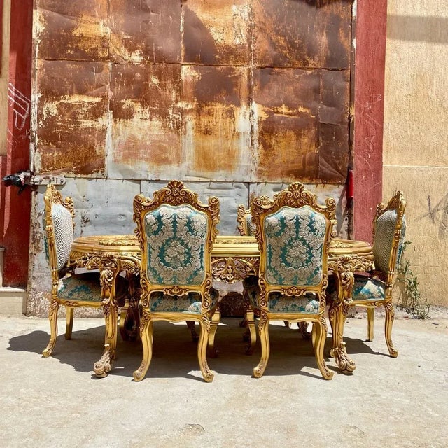 This is a beautiful fully repainted dining room set with 6 chairs. This is a heavy set with beautiful carvings. The table...