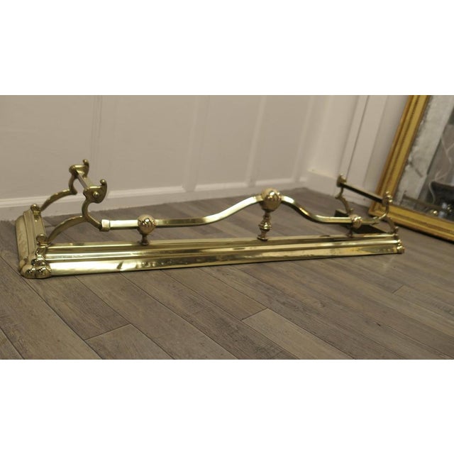Large Victorian Art Nouveau Brass Fender. This is a Beautifully Designed Victorian Brass Fender it has Art Nouveau...