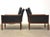 A modern set of lounge chairs with a sculpted rosewood frame designed by Knut Saeter for Vatne Möbler. 30.5” wide 30.25”...